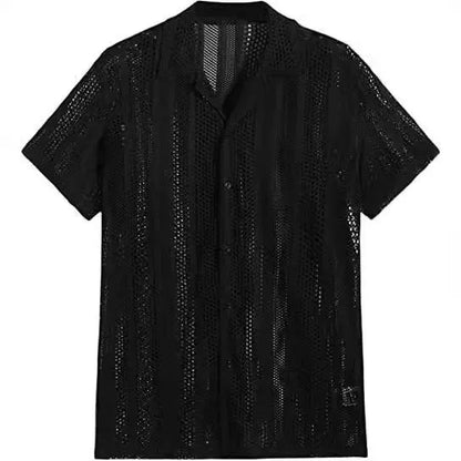 Man wearing a black short-sleeved knitted button-up shirt with a jacquard textured pattern.