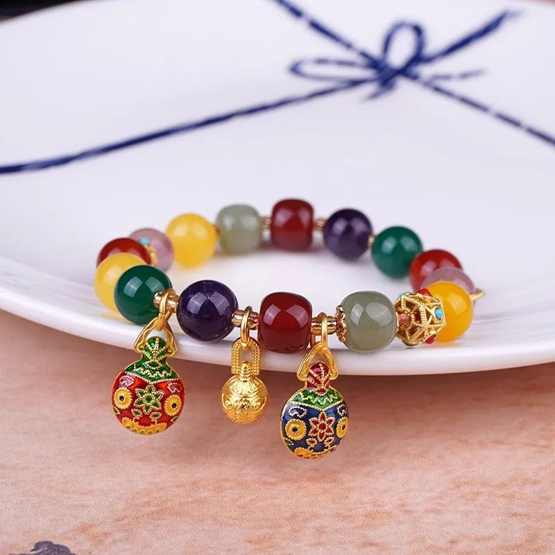 Bracelet featuring hand-woven 10mm agate beads with a swallowing gold beast charm in a popular net red wind style, selected for material purity and detailed animal/zodiac modelling.