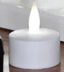 White plastic USB rechargeable LED candle with yellow flashing light mode, measuring 5.5cm tall