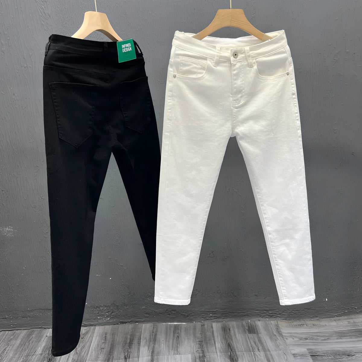 Men's white slim fit jeans with mid to low waist, micro elastic denim and small straight leg