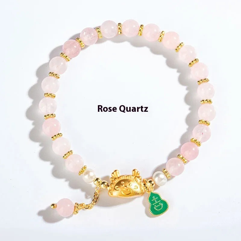Natural agate and crystal bracelet with 8mm diamond-cut beads on a wrist.