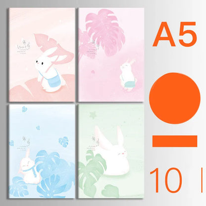 Pack of ten A5 kraft paper thread-bound notebooks with artistic cover designs lying flat.