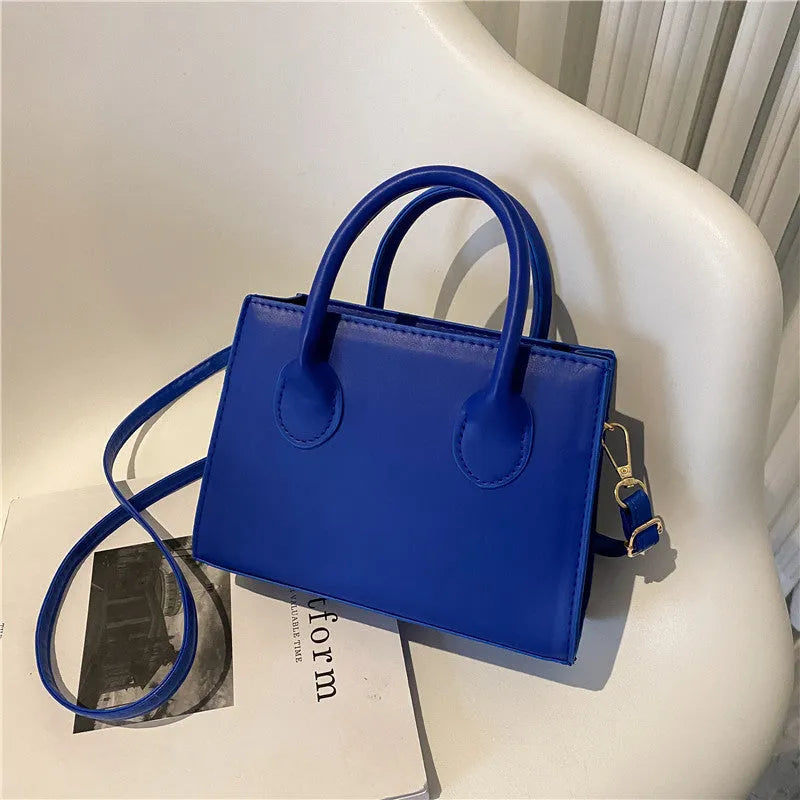 Women's small square PU leather shoulder bag in five colour options showing retro street styling