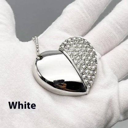 Blue heart-shaped USB flash drive with a brick-inlaid pattern on its metal surface.