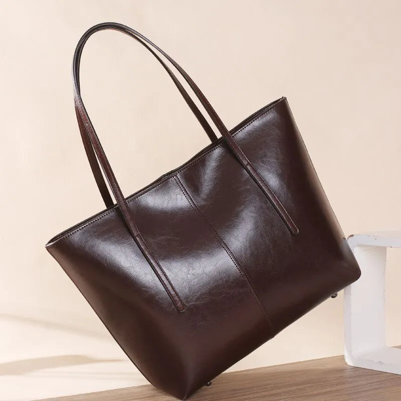 Genuine leather women's shoulder bag in retro style with multiple internal compartments and slit outer pocket