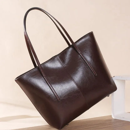 Genuine leather women's shoulder bag in retro style with multiple internal compartments and slit outer pocket