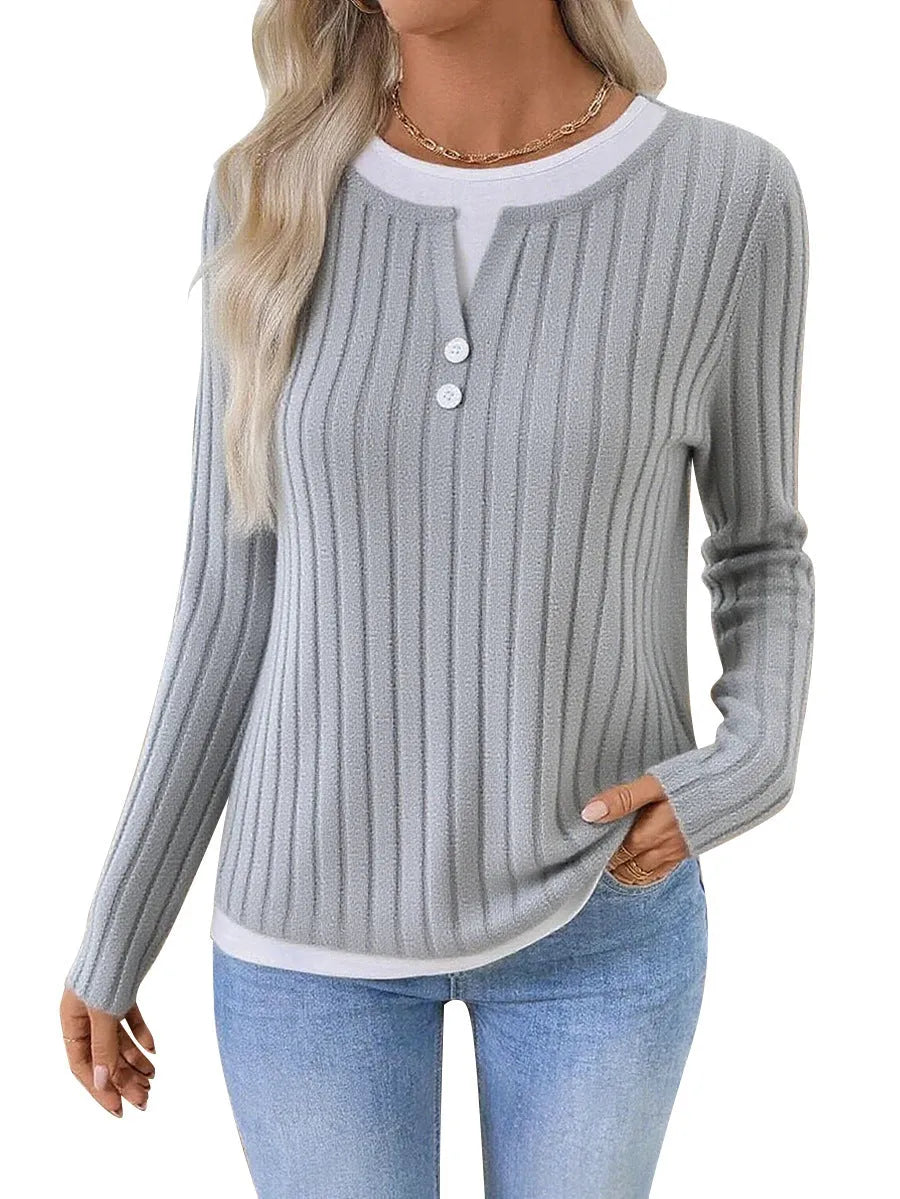 Women's black fake two-piece pullover sweater with concave stripe texture and round neck.