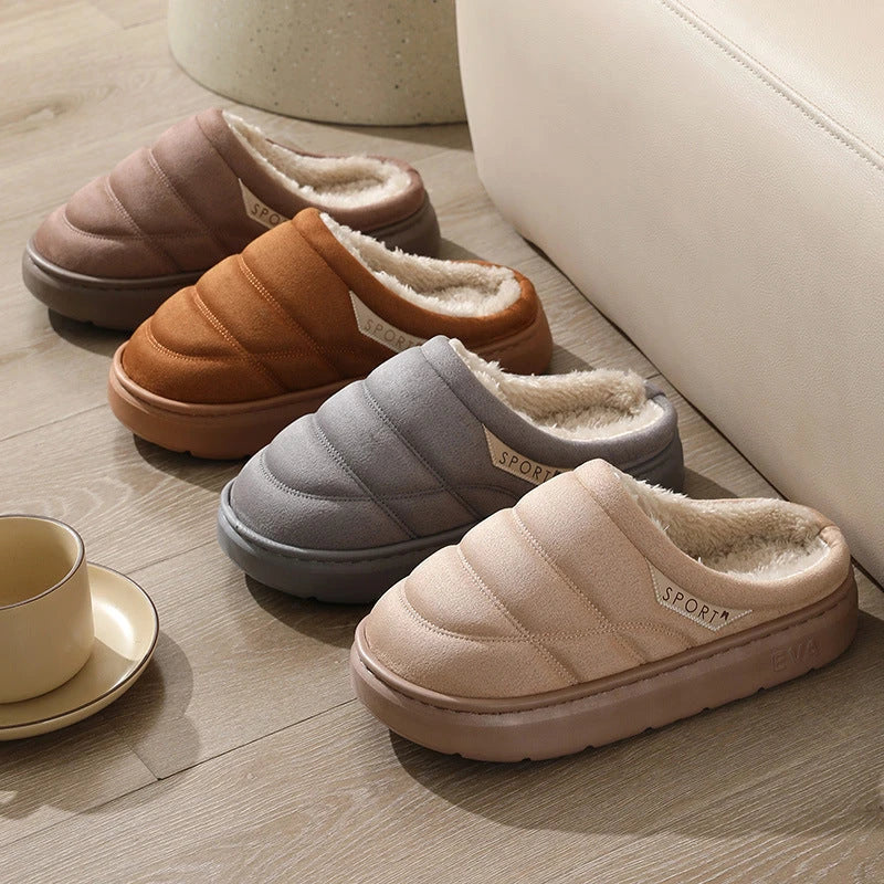 Cozy plush slip-on slippers in various colors, featuring a soft suede-like upper and a supportive EVA sole for maximum comfort and warmth.