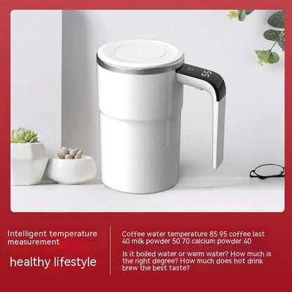 Electric coffee mug with USB charging port, magnetic stirrer, and LCD display showing temperature, in black or white colour.