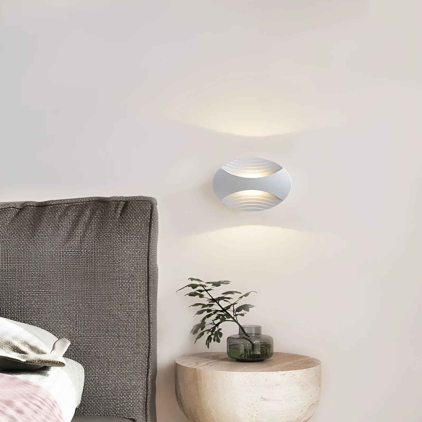 Aluminium wall lamp with 10W LED showing three light colour options and IP65 rating for bedroom or outdoor use