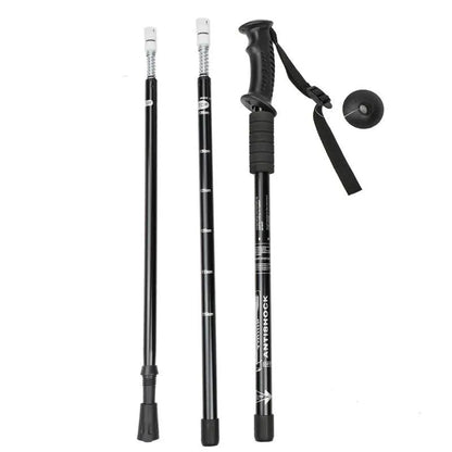 Aluminium alloy telescopic trekking pole extended with three straight handles and accessory attachments