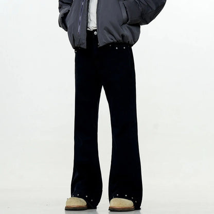 A pair of black straight-leg cotton jeans with a mid-waist fit and horn-style leg opening on a plain background.