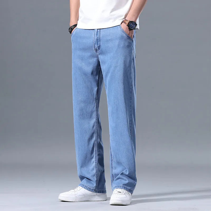 Men's loose straight-leg jeans in lyocell-cotton blend casual trousers for everyday wear with zipper fly opening, available in light blue, blue gray, smoky gray and retro blue colour options, waist sizes 28 to 40 with straight-leg fit