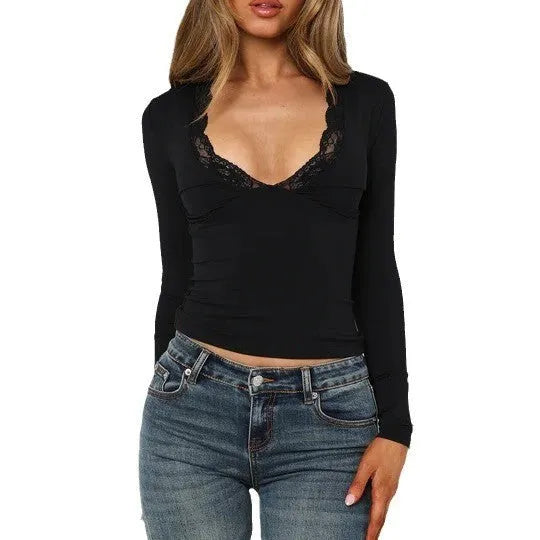 Women's slim fit black pullover top with long sleeves and decorative lace floral design.