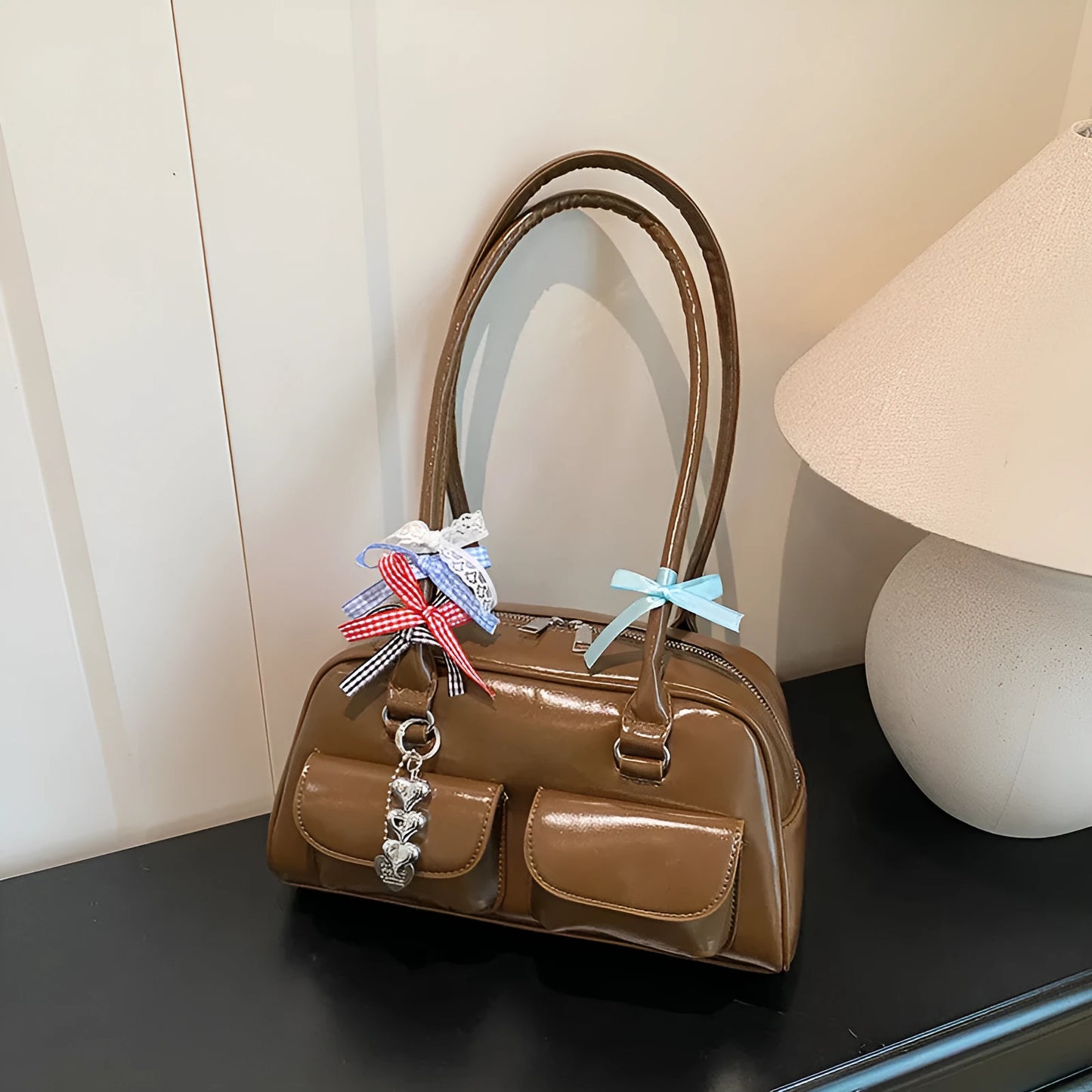 Women's retro pillow-shaped handbag in PU leather with double shoulder straps and flap closure
