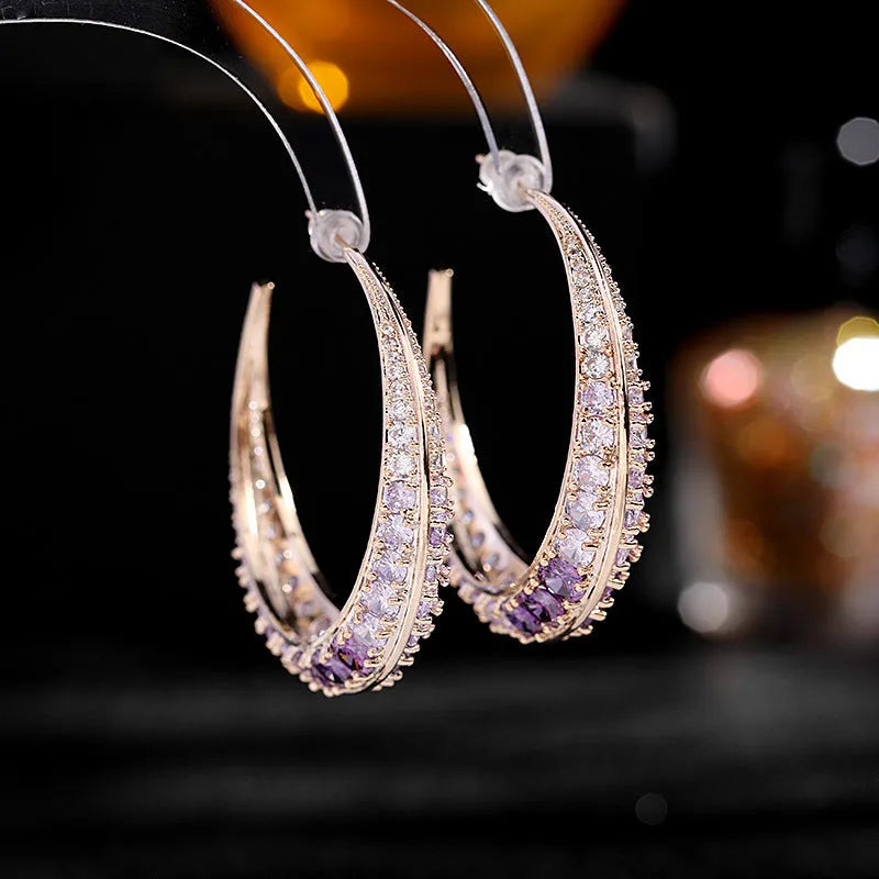Women's geometric copper hoop earrings in gold white zirconium finish, showing 4.3 cm by 4.5 cm drop shape.