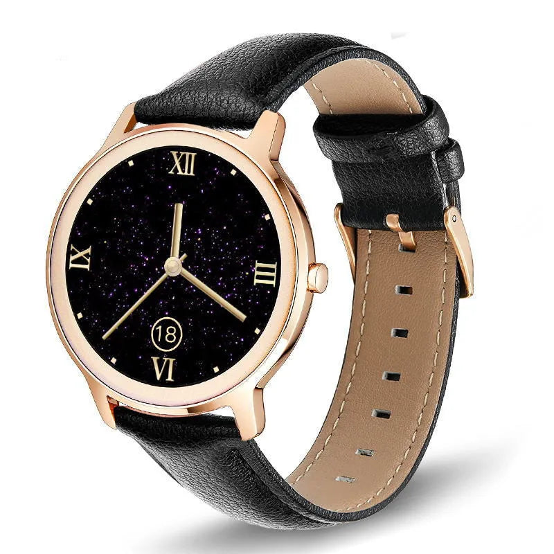 Women's rose gold smart watch with stainless steel mesh band on wrist, showing time on 1.3 inch screen