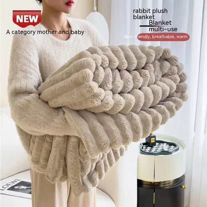 Double-sided bubble velvet faux rabbit fur blanket in a solid colour, shown folded.