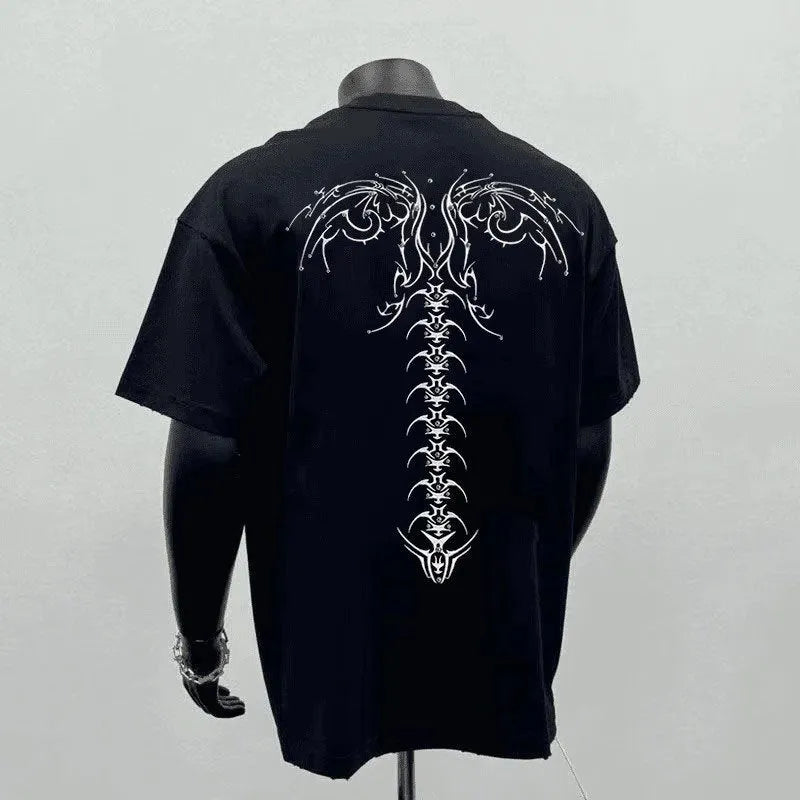 Men's loose fit black cotton short sleeve t-shirt on a hanger.