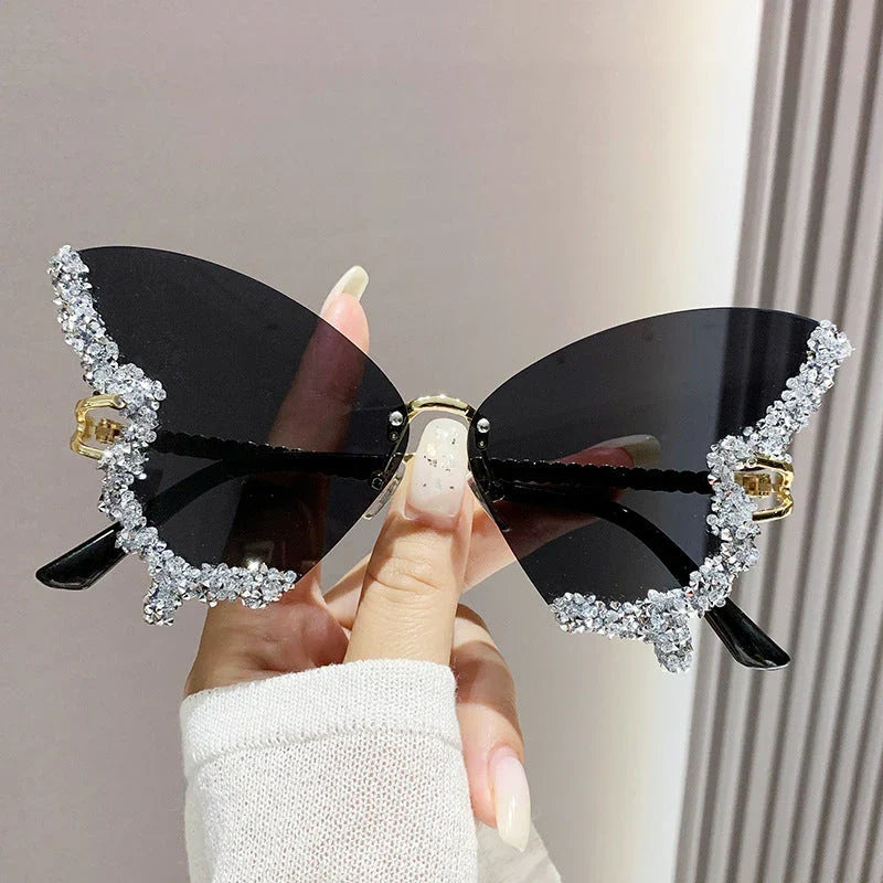 Chic butterfly-shaped sunglasses with diamond accents in various gradient color options