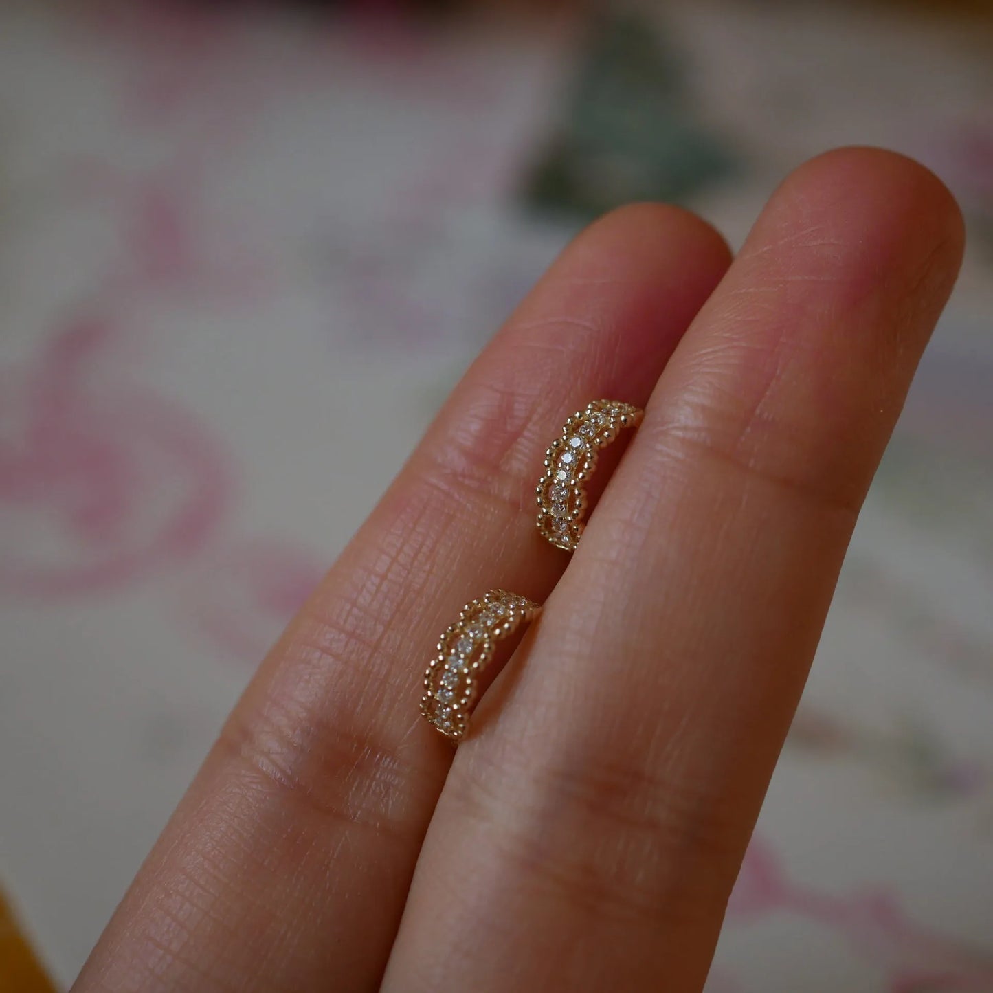 Small silver lace clip earrings with gold finish and secure clip back
