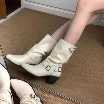 Women's chunky heel boots in white colour with 2.5cm flat heel and middle calf length