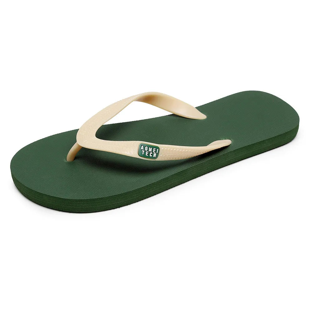 Men's black flip-flop slippers with EVA upper and textured rubber sole on a sandy background.