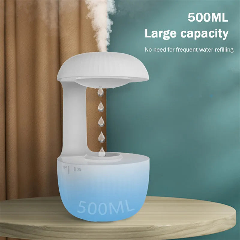 White anti-gravity humidifier showing water droplets appearing to levitate upwards from its base