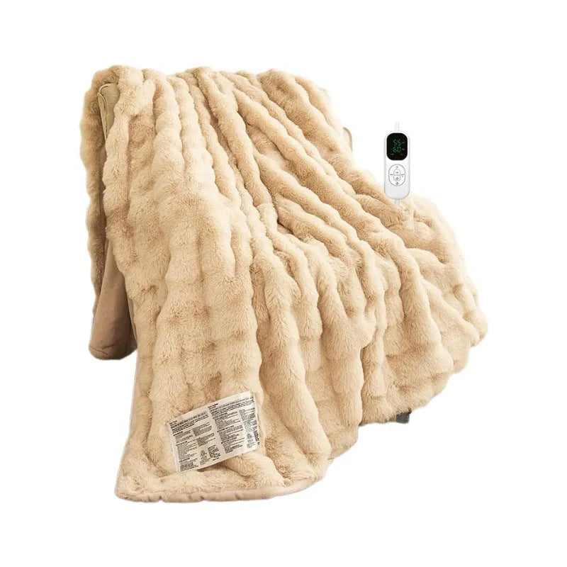 Dark grey far infrared electric heating blanket with carbon fibre elements on a double bed.