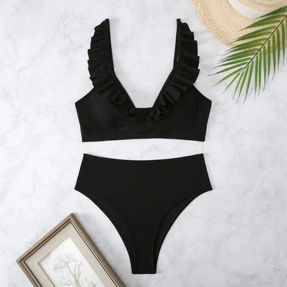 Women's retro striped split chest bikini swimsuit on a hanger
