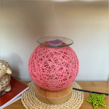 Elegant bamboo wood wax melt warmer with dimming night light feature, available in beige, blue, and pink colours