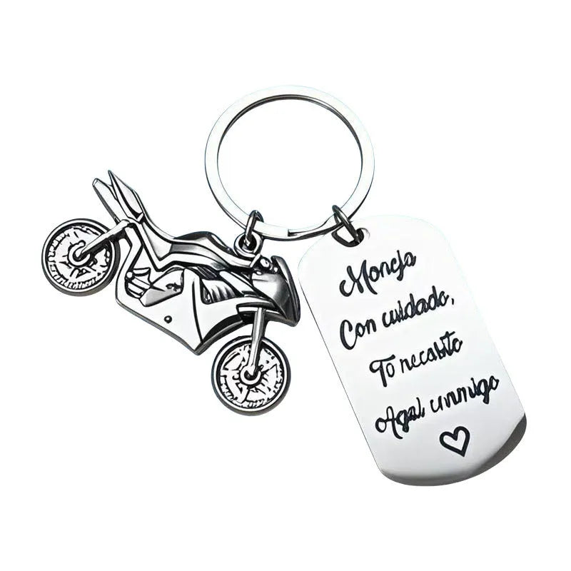Stainless steel motorcycle-themed keychain with modern design and protective flannel bag