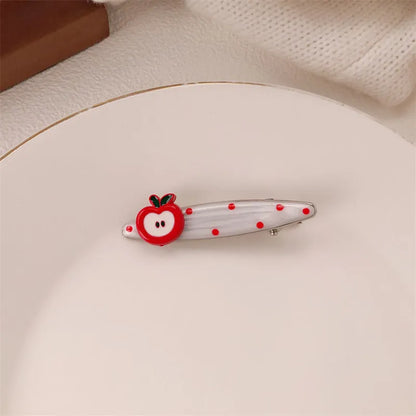 Red love heart-shaped hair barrette clip with retro white dots on a willow leaf-shaped base.