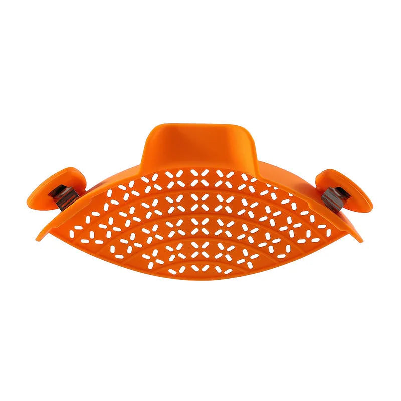 Silicone and stainless steel pot side drain stopper kitchen gadget in assorted colours.