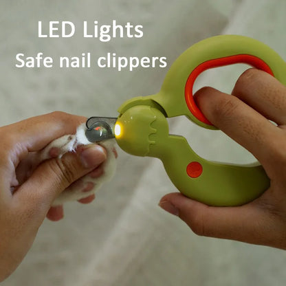 Blue pet nail clippers with LED light on for trimming cat or dog claws