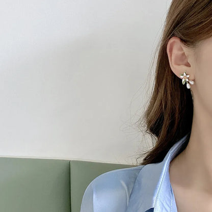 Alloy flower earring set with sterling silver needle detailing showing both stud and clip styles