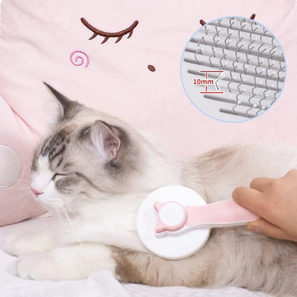 Blue self-cleaning cat brush with rubber-tipped pins and non-slip handle for grooming pets