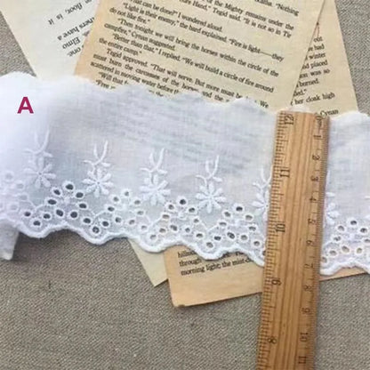 Cotton embroidered lace trim ribbon showing floral cutout patterns in four different width styles