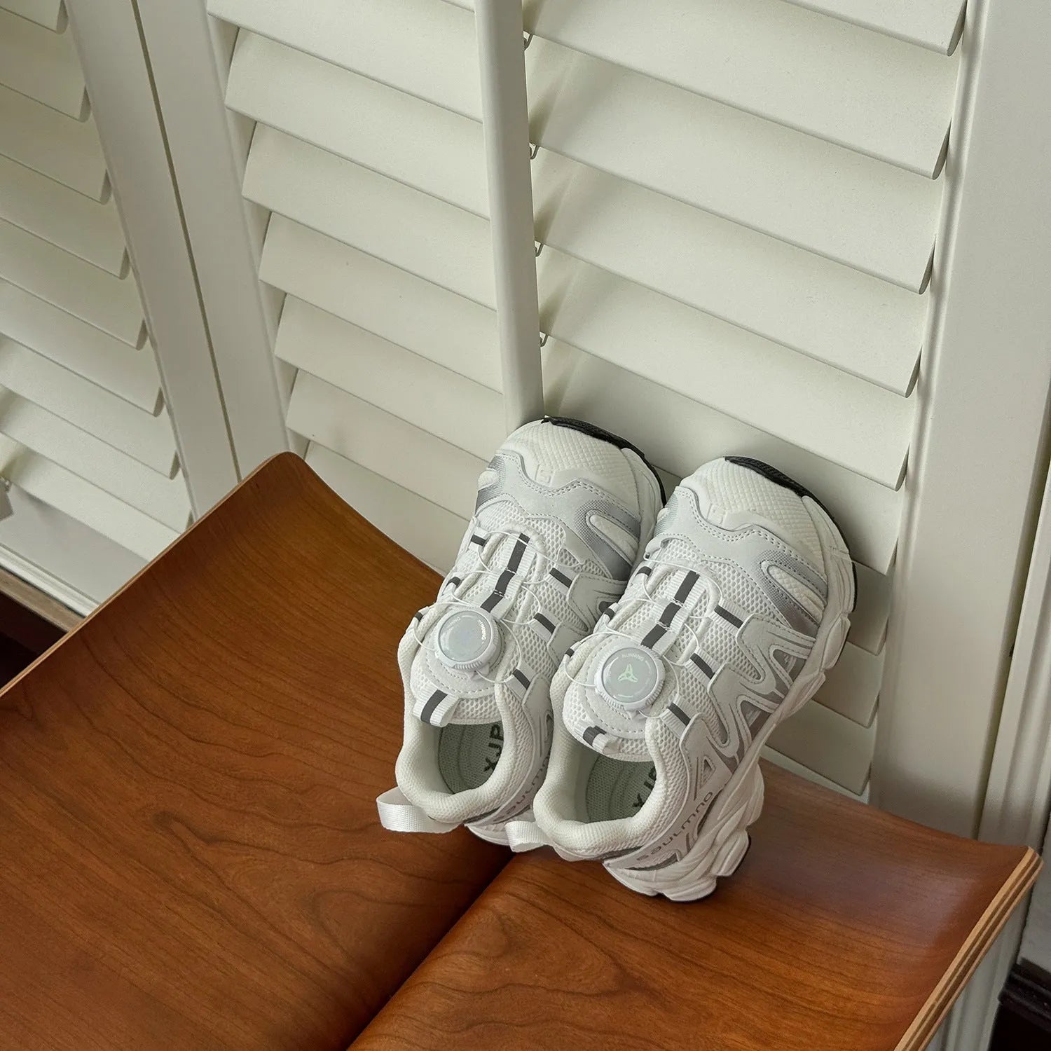Girls casual shoes in black, beige, or pink with PU leather mesh upper.