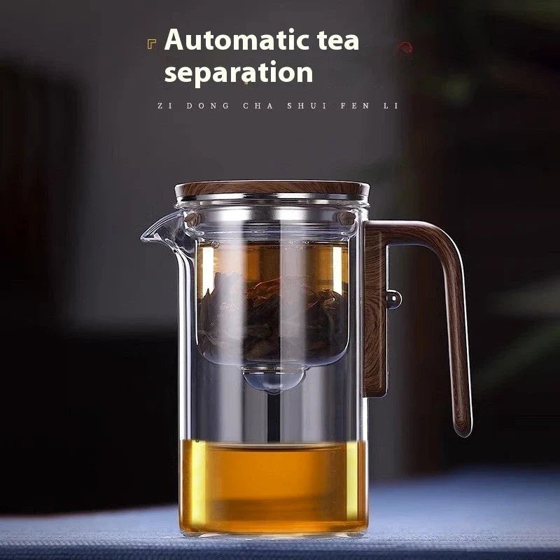 Elegant glass teapot with magnetic water separation filter and wooden handle for brewing and pouring loose leaf tea