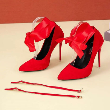 Women's black thin shallow mouth strap high heels with pointed toe on a white background