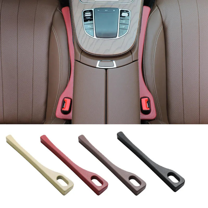 Polyurethane car seat gap filler strip in assorted colours on a car seat.