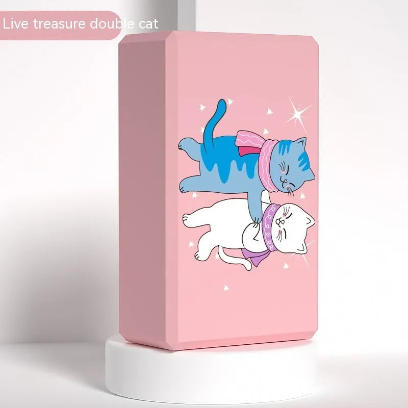 High-density EVA foam yoga block in violet colour, shown next to a pink block with a cartoon bunny print.