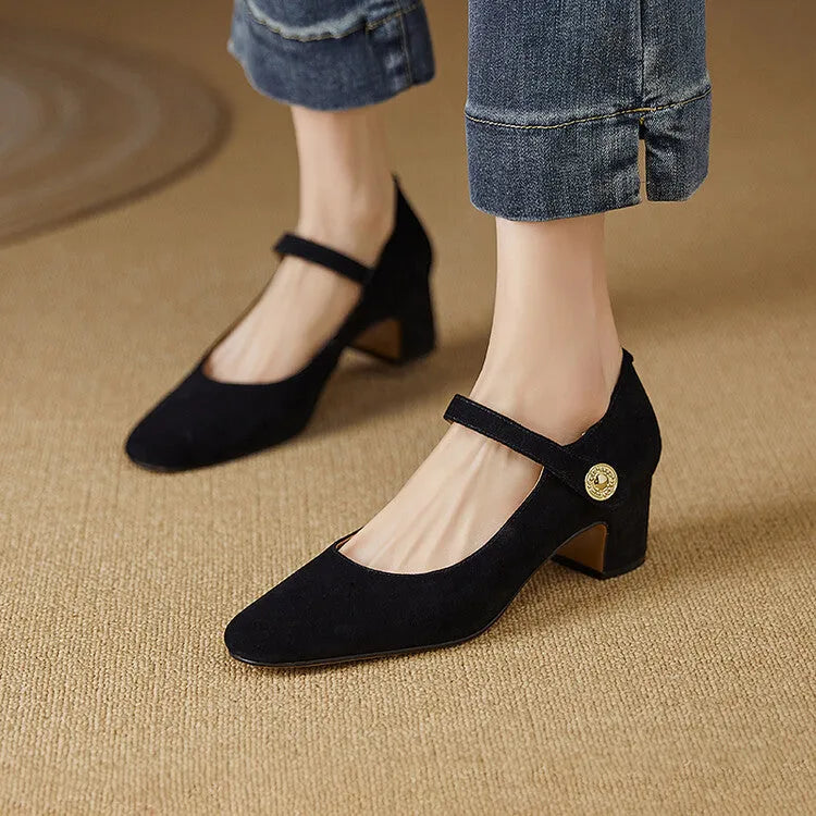 Women's dark green suede Mary Jane shoes with a chunky heel and square toe.