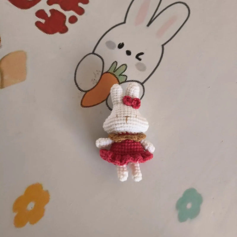Hand-crocheted rabbit key chain charm, wool amigurumi craft accessory for keys, bag charms or decorative pendant, handmade crochet animal trinket, gift with or without metal key ring