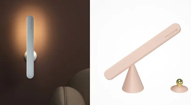 White geometric desk lamp with magnetic base and touch control on a wooden table.