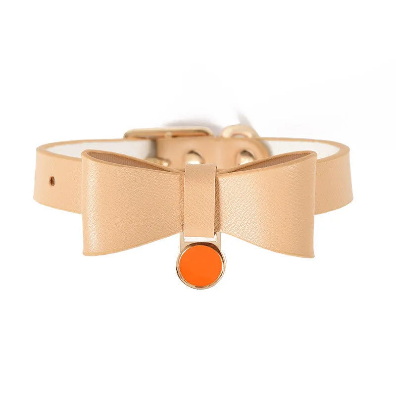 Brown leather cat collar shown on a white background.