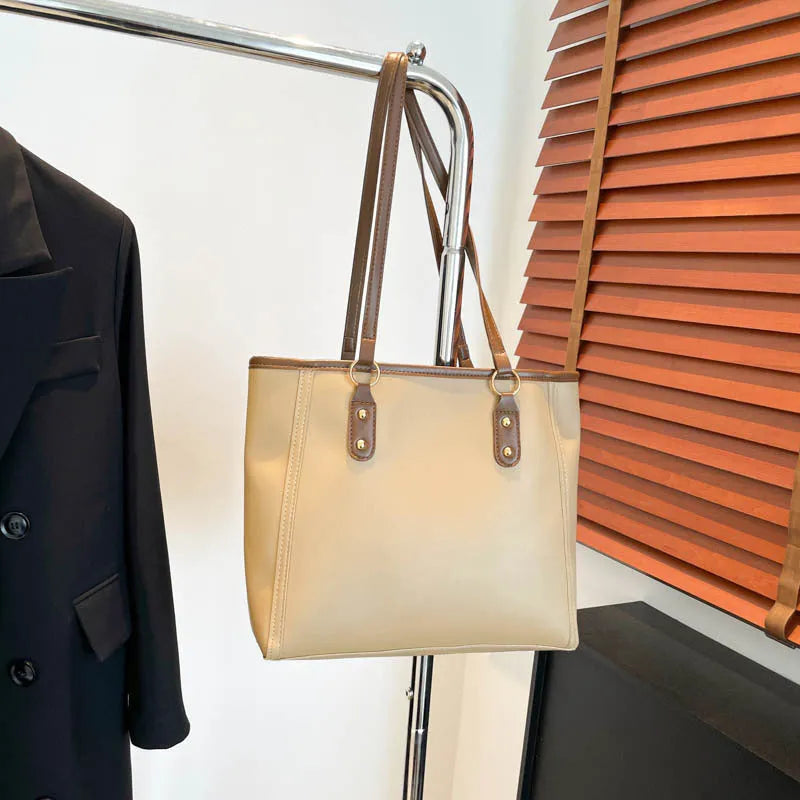 Korean style black PU leather shoulder underarm bag with a horizontal square shape and sandwich pocket.
