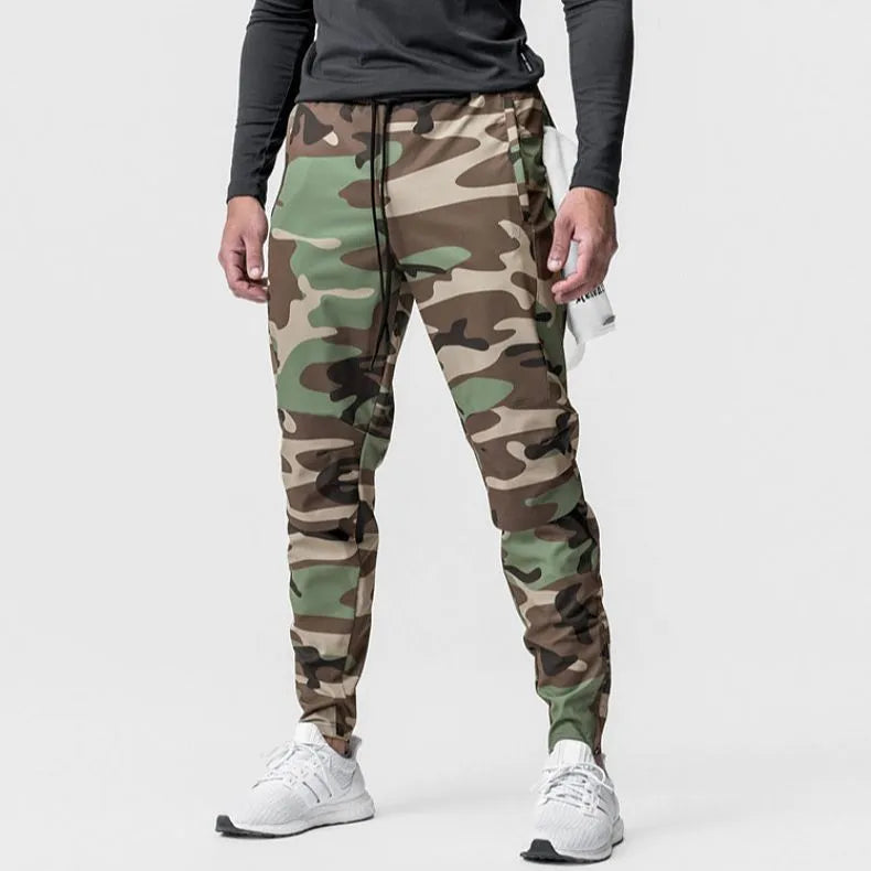 Men's grey fitness trousers with ankle ties, made from 100% polyester for quick-drying during exercise