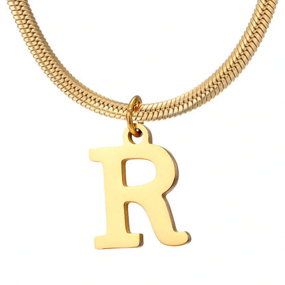 Elegant gold A-Z letter pendant necklace on a snake chain